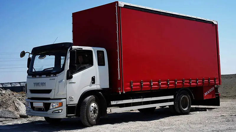 نمای کناری کامیون 11 تن باری یوجین